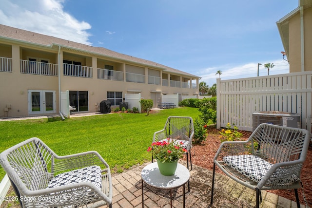 5201 Ocean Beach Blvd Unit 4, Cocoa Beach, FL 32931 - view of patio / terrace featuring area for grilling and french doors