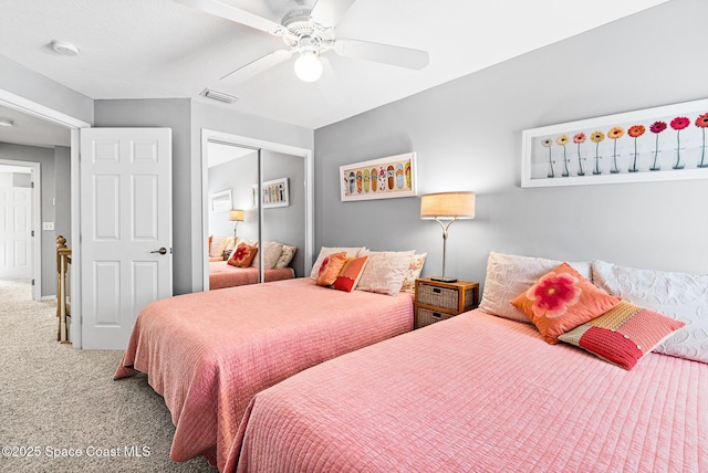 5201 Ocean Beach Blvd Unit 4, Cocoa Beach, FL 32931 - carpeted bedroom featuring a closet and ceiling fan