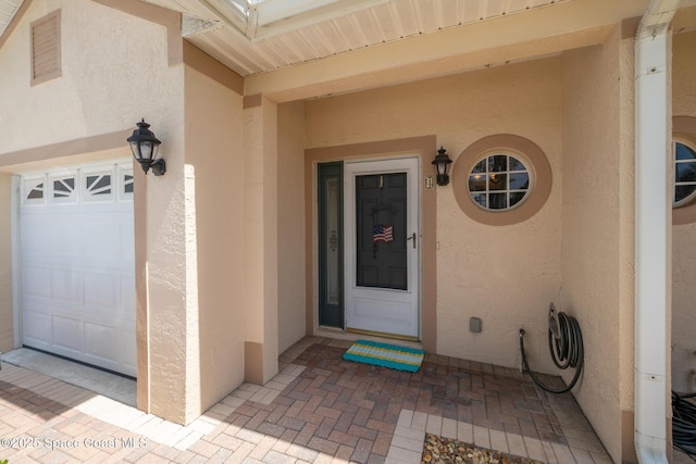 5201 Ocean Beach Blvd Unit 4, Cocoa Beach, FL 32931 - view of exterior entry with stucco siding