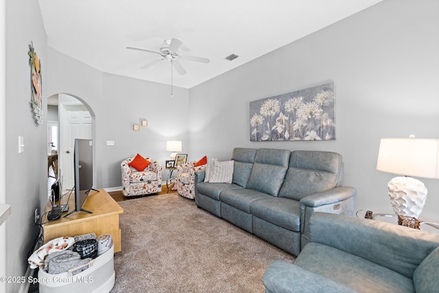 5201 Ocean Beach Blvd Unit 4, Cocoa Beach, FL 32931 - living area featuring arched walkways and a ceiling fan