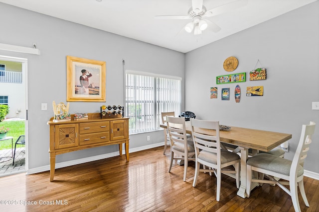 5201 Ocean Beach Blvd Unit 4, Cocoa Beach, FL 32931 - dining room featuring wood finished floors and ceiling fan