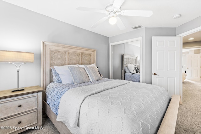 5201 Ocean Beach Blvd Unit 4, Cocoa Beach, FL 32931 - bedroom with carpet flooring, a closet, and a ceiling fan