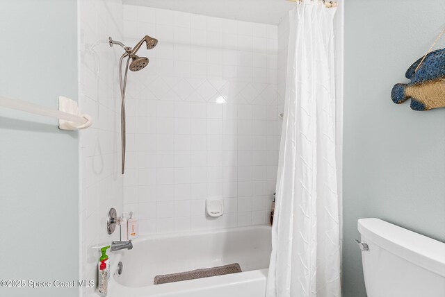 5201 Ocean Beach Blvd Unit 4, Cocoa Beach, FL 32931 - bathroom with shower / tub combo and toilet