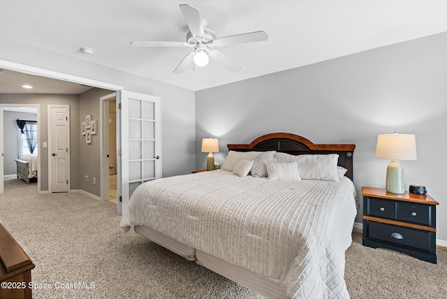 5201 Ocean Beach Blvd Unit 4, Cocoa Beach, FL 32931 - carpeted bedroom with baseboards and a ceiling fan