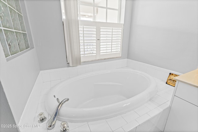 5201 Ocean Beach Blvd Unit 4, Cocoa Beach, FL 32931 - full bath featuring a garden tub and vanity