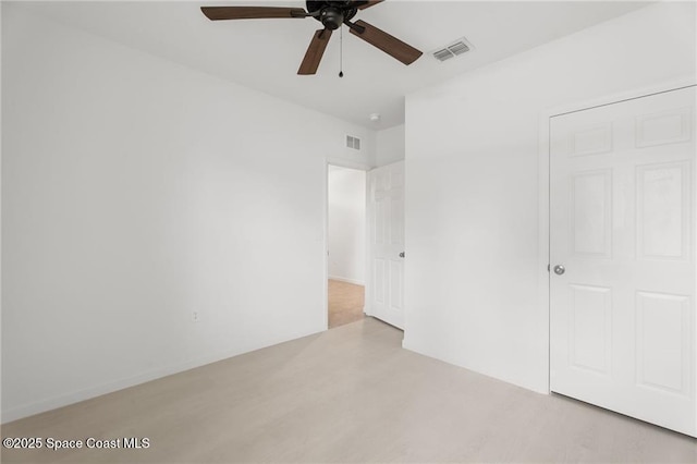 1093 Wabash Rd SE, Palm Bay, FL 32909 - unfurnished bedroom featuring a ceiling fan