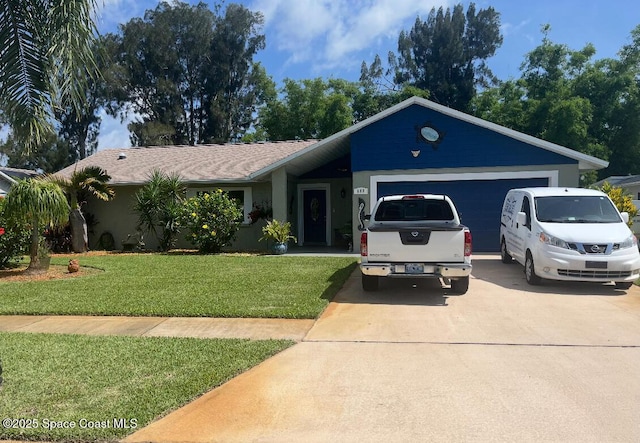 680 Oak Park Cir, Merritt Island, FL 32953 - single story home with concrete driveway, an attached garage, and a front lawn