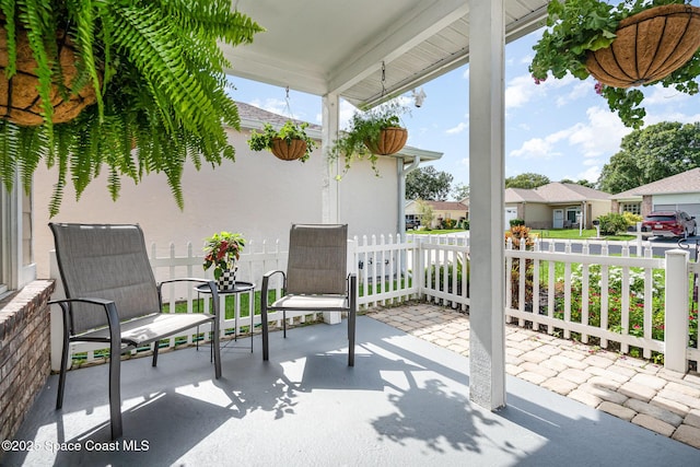 914 S Fork Cir, Melbourne, FL 32901 - view of patio / terrace featuring a residential view