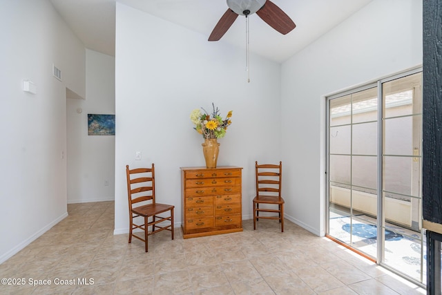 914 S Fork Cir, Melbourne, FL 32901 - living area with ceiling fan, lofted ceiling, and light tile patterned floors