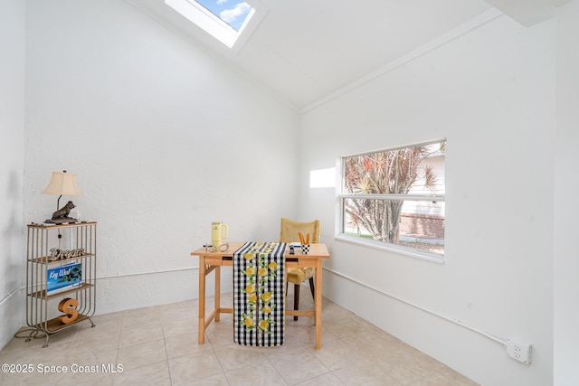 914 S Fork Cir, Melbourne, FL 32901 - home office featuring lofted ceiling, a skylight, healthy amount of natural light, and tile patterned floors