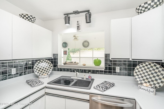 914 S Fork Cir, Melbourne, FL 32901 - kitchen with dishwasher, light countertops, backsplash, and white cabinetry