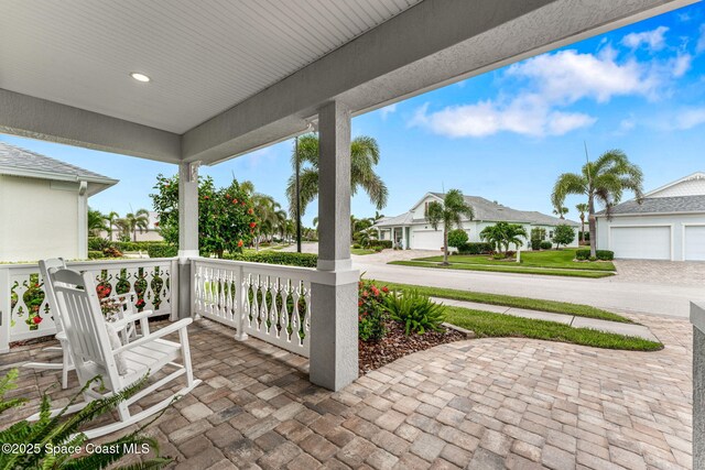 1649 Tullagee Ave, Melbourne, FL 32940 - covered porch featuring a residential view