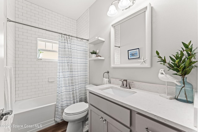 1649 Tullagee Ave, Melbourne, FL 32940 - bathroom with vanity, shower / bathtub combination with curtain, and wood finished floors
