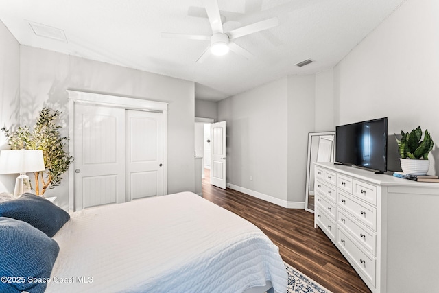 1649 Tullagee Ave, Melbourne, FL 32940 - bedroom with dark wood finished floors, a closet, a ceiling fan, and attic access