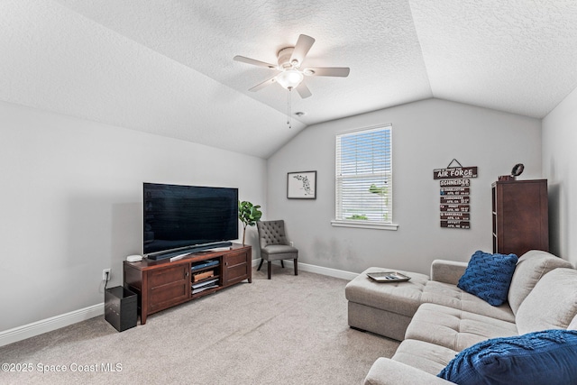 1649 Tullagee Ave, Melbourne, FL 32940 - carpeted living room featuring vaulted ceiling, a ceiling fan, and a textured ceiling