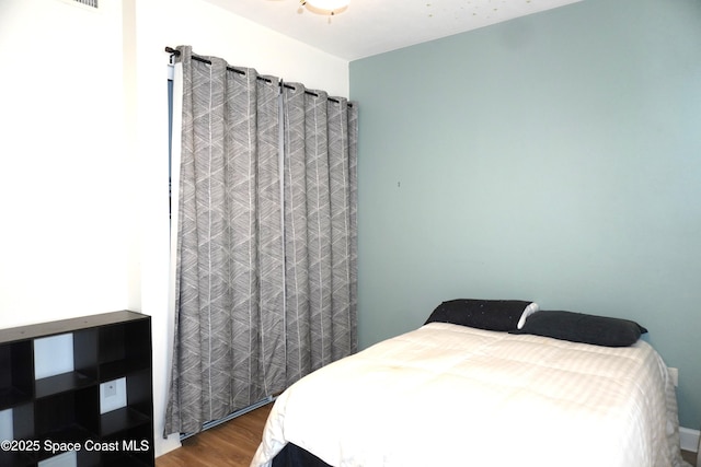 1320 NW 3rd Ave # 238, Gainesville, FL 32608 - bedroom featuring wood finished floors