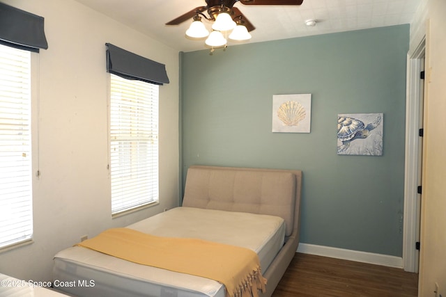 1320 NW 3rd Ave # 238, Gainesville, FL 32608 - bedroom with wood finished floors and ceiling fan