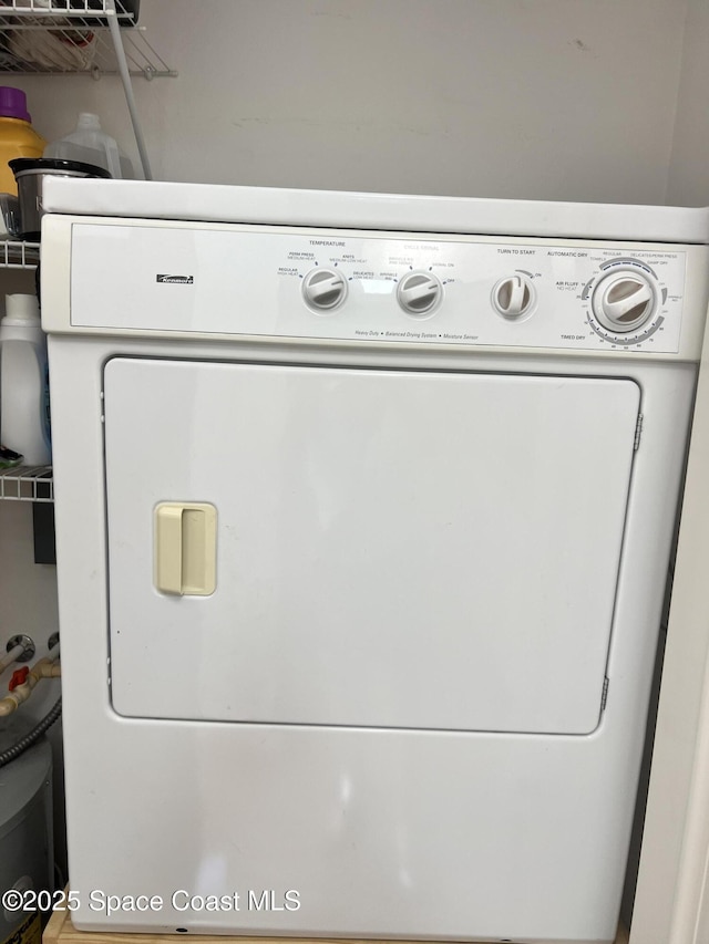 1320 NW 3rd Ave # 238, Gainesville, FL 32608 - washroom featuring washer / dryer