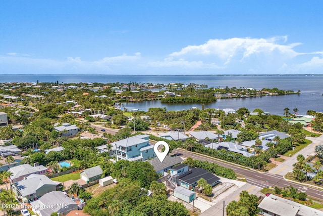 1121 S Orlando Ave, Cocoa Beach, FL 32931 - aerial view of residential area featuring a nearby body of water