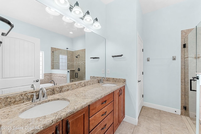 1121 S Orlando Ave, Cocoa Beach, FL 32931 - bathroom featuring a shower stall, double vanity, a garden tub, and tile patterned floors