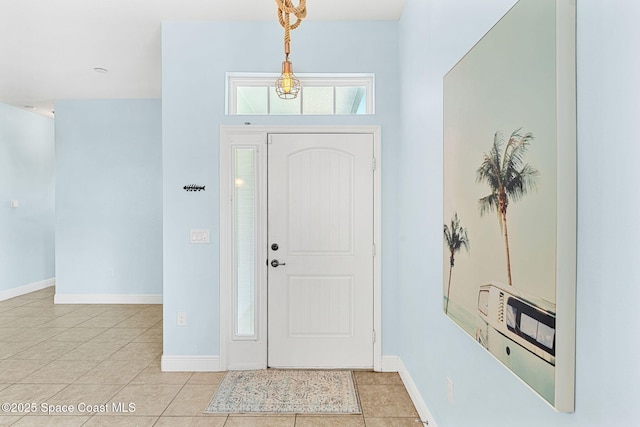 1121 S Orlando Ave, Cocoa Beach, FL 32931 - tiled foyer with baseboards