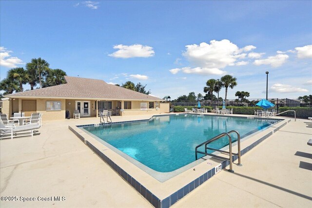 1020 Abada Ct NE Unit 108, Palm Bay, FL 32905 - community pool featuring a patio area