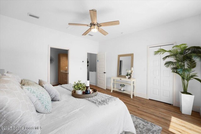 833 Paddleboard Ct, Melbourne, FL 32935 - bedroom with wood finished floors and ceiling fan