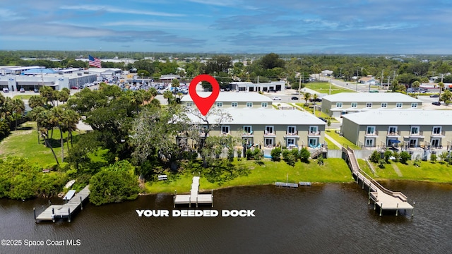 833 Paddleboard Ct, Melbourne, FL 32935 - drone / aerial view of a large body of water and a tree filled landscape
