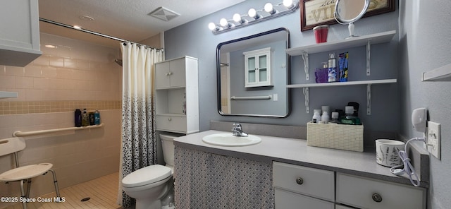 2135 N Courtenay Pkwy Unit 104, Merritt Island, FL 32953 - full bathroom featuring tiled shower and vanity