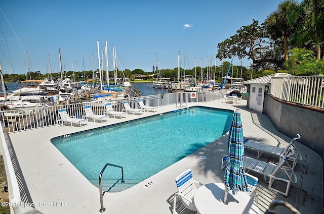 905 N Harbor City Blvd Unit 403, Melbourne, FL 32935 - community pool with view of marina, a water view, and a patio area