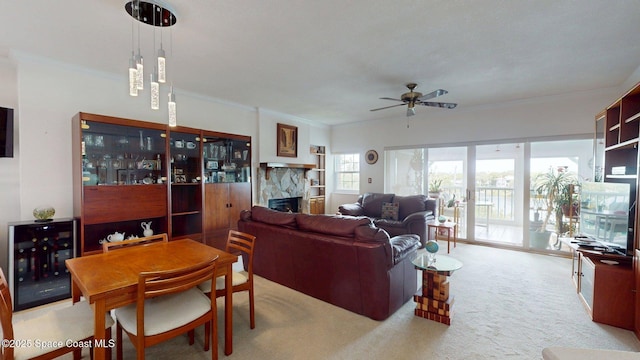 905 N Harbor City Blvd Unit 403, Melbourne, FL 32935 - living room with a ceiling fan, a fireplace, carpet flooring, ornamental molding, and wine cooler