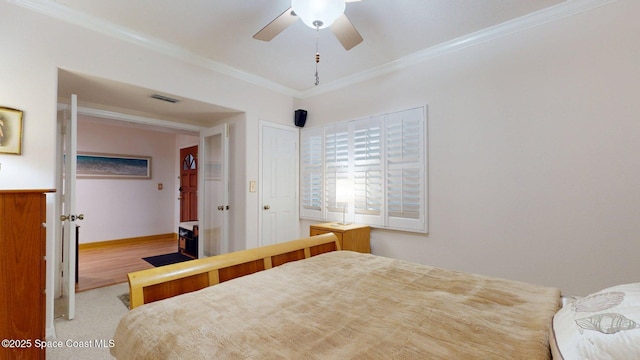 905 N Harbor City Blvd Unit 403, Melbourne, FL 32935 - bedroom with ornamental molding, a closet, and a ceiling fan