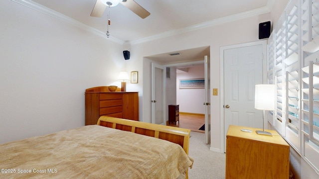 905 N Harbor City Blvd Unit 403, Melbourne, FL 32935 - bedroom featuring ornamental molding, carpet, and a ceiling fan