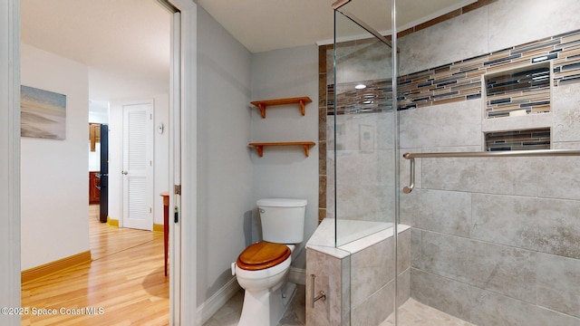 905 N Harbor City Blvd Unit 403, Melbourne, FL 32935 - full bathroom with a stall shower and wood finished floors