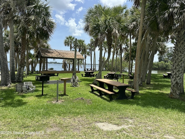 111 Plover Ln Unit 3-35, Rockledge, FL 32955 - view of home's community with a gazebo, a lawn, and a water view