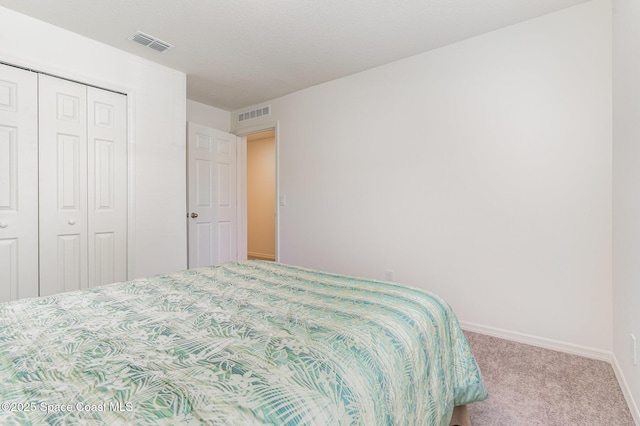 788 Isar Ave NW, Palm Bay, FL 32907 - bedroom featuring carpet flooring and a closet