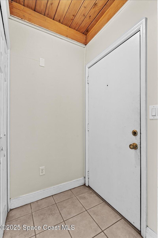 1636 Dixie Way, Melbourne, FL 32935 - entrance foyer featuring light tile patterned floors and wood ceiling