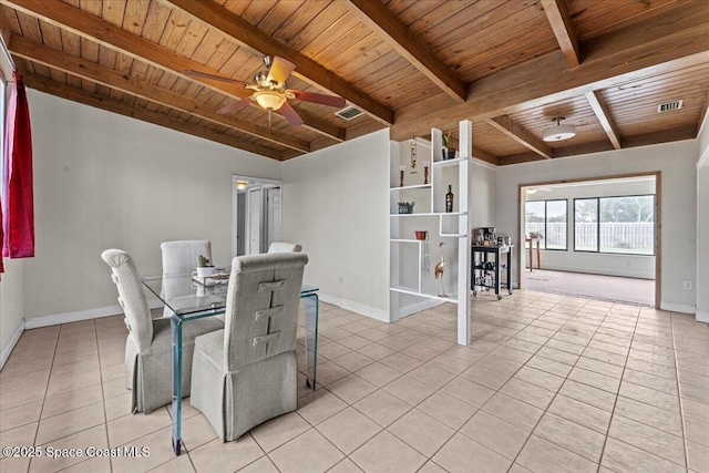 1636 Dixie Way, Melbourne, FL 32935 - dining space with a wood ceiling with exposed beams, light tile patterned flooring, and ceiling fan