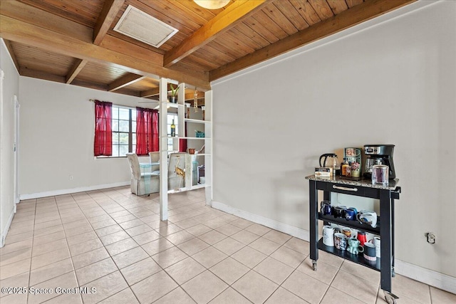 1636 Dixie Way, Melbourne, FL 32935 - unfurnished room featuring a wooden ceiling with exposed beams and light tile patterned floors