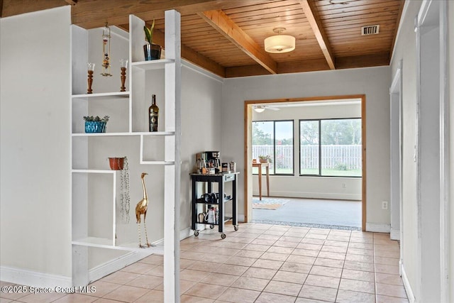 1636 Dixie Way, Melbourne, FL 32935 - hall with a wood ceiling with exposed beams and light tile patterned floors