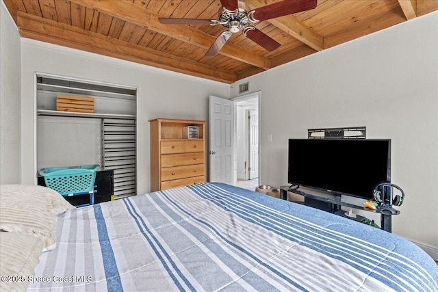 1636 Dixie Way, Melbourne, FL 32935 - bedroom featuring a wooden ceiling with exposed beams, a closet, and a ceiling fan