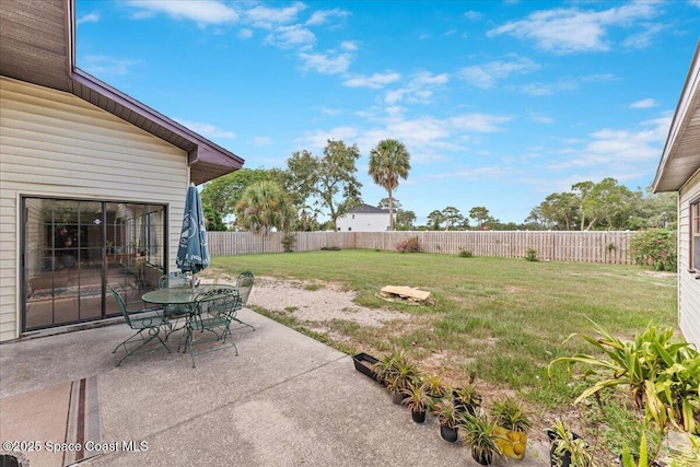 1636 Dixie Way, Melbourne, FL 32935 - fenced backyard with a patio area