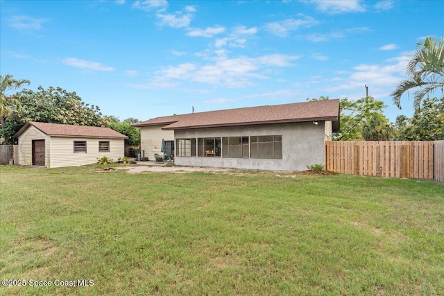 1636 Dixie Way, Melbourne, FL 32935 - rear view of house featuring an outdoor structure and stucco siding