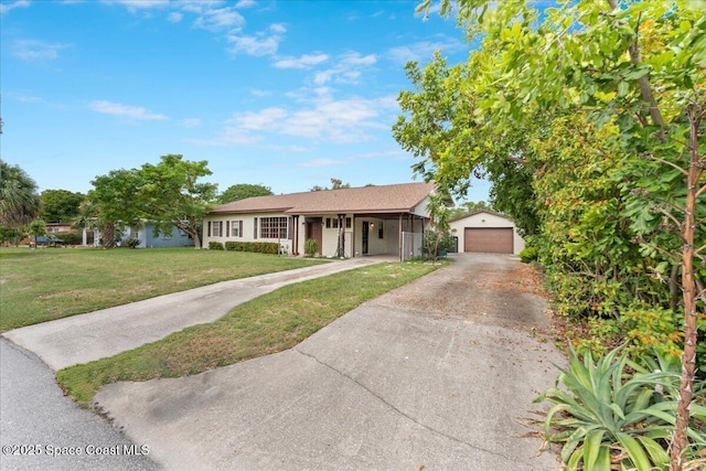 1636 Dixie Way, Melbourne, FL 32935 - ranch-style house featuring a front yard, a garage, and an outdoor structure