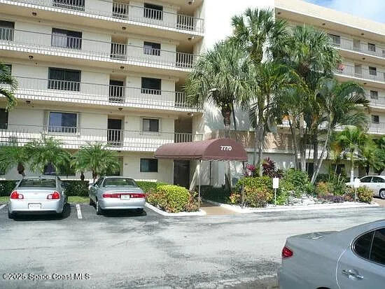 7770 Tahiti Ln Unit 208, Lake Worth, FL 33467 - view of apartment building / complex with uncovered parking