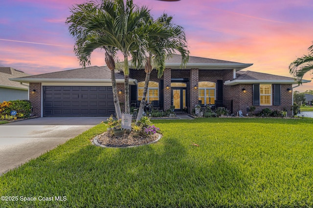 231 Nardo Ave SW, Palm Bay, FL 32908 - ranch-style house featuring an attached garage, concrete driveway, a front lawn, and brick siding