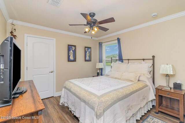 231 Nardo Ave SW, Palm Bay, FL 32908 - bedroom featuring crown molding, wood finished floors, and ceiling fan