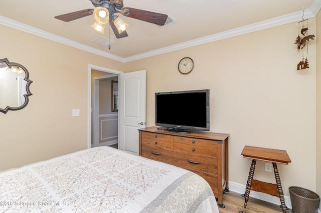 231 Nardo Ave SW, Palm Bay, FL 32908 - bedroom featuring crown molding, wood finished floors, and ceiling fan