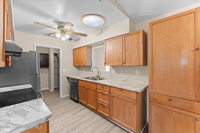 5510 Holden Rd, Cocoa, FL 32927 - kitchen with wall chimney range hood, appliances with stainless steel finishes, light countertops, a ceiling fan, and a textured ceiling