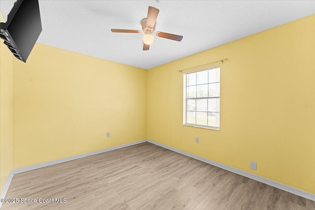 5510 Holden Rd, Cocoa, FL 32927 - empty room featuring light wood-style flooring and a ceiling fan